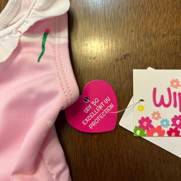 NWT Wippette bathing suit in pink with white scallops at neckline. UPF 50 - Picture 2 of 4